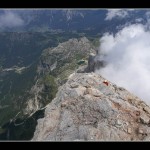 Dalla cima: il mio compare sotto e più giù il lago di Alleghe